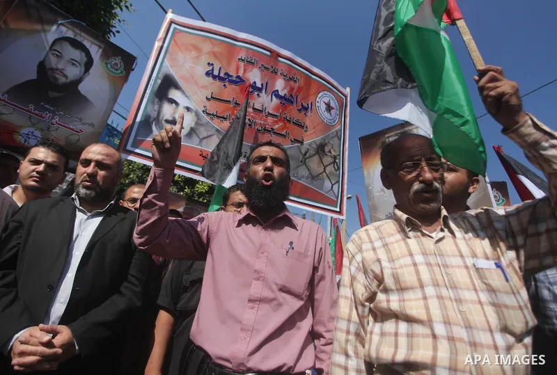 Palestinians participate a protest to calling for the liberty of Palestinians being held in Israeli jails, in Gaza city of on September 18, 2012 . Photo by Ashraf Amar