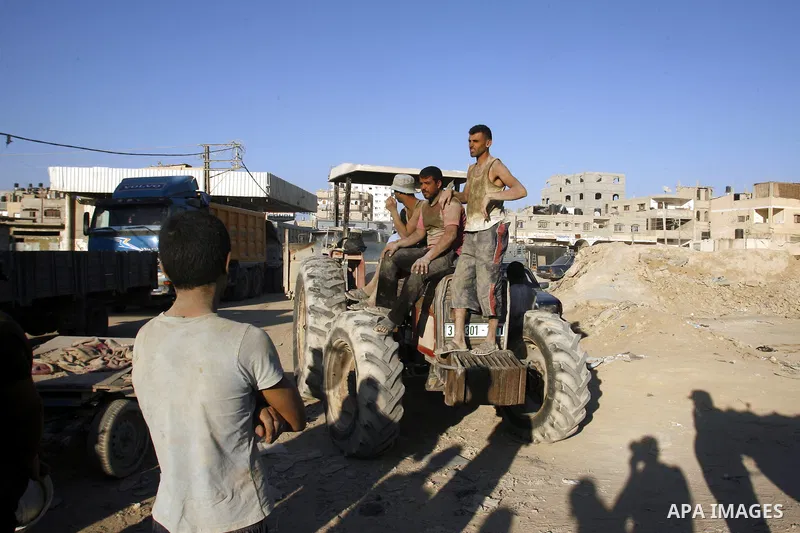 Palestinian tunnels workers stop working during a protest against the Egyptian decision to close the smuggling tunnels along the Gaza-Egypt border in Rafah, in the southern Gaza Strip, on Sept. 18, 2012. The tunnels trad...