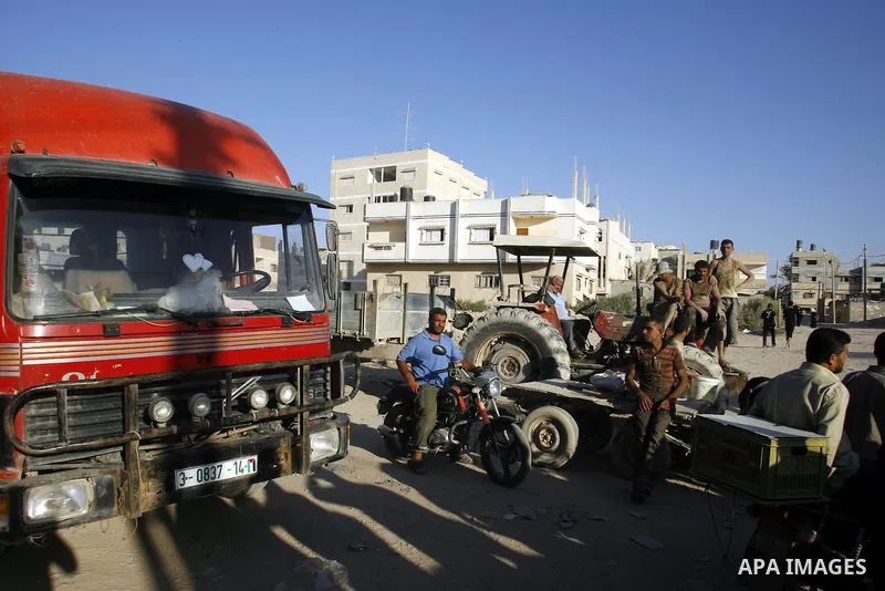 Palestinian tunnels workers stop working during a protest against the Egyptian decision to close the smuggling tunnels along the Gaza-Egypt border in Rafah, in the southern Gaza Strip, on Sept. 18, 2012. The tunnels trad...