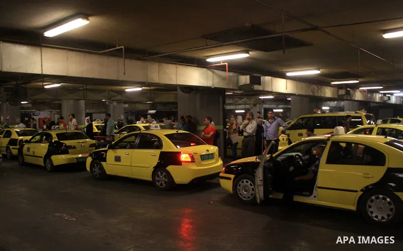 Palestinian taxi drivers stop their cars for 15 minutes during a solidarity with the Palestinian prisoners on hunger strike in Israeli jails, in the West Bank city of Nablus, on Sept. 20, 2012. Photo by Nedal Eshtayah