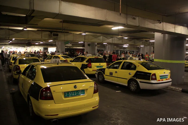 Palestinian taxi drivers stop their cars for 15 minutes during a solidarity with the Palestinian prisoners on hunger strike in Israeli jails, in the West Bank city of Nablus, on Sept. 20, 2012. Photo by Nedal Eshtayah