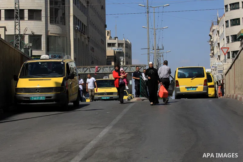Palestinian taxi drivers stop their cars for 15 minutes during a solidarity with the Palestinian prisoners on hunger strike in Israeli jails, in the West Bank city of Nablus, on Sept. 20, 2012. Photo by Nedal Eshtayah
