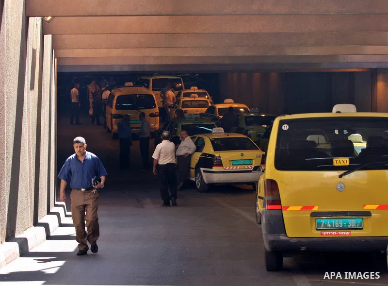Palestinian taxi drivers stop their cars for 15 minutes during a solidarity with the Palestinian prisoners on hunger strike in Israeli jails, in the West Bank city of Nablus, on Sept. 20, 2012. Photo by Nedal Eshtayah