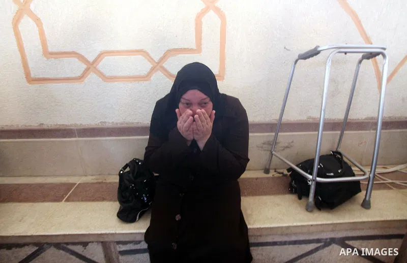 A relative of Palestinian security official Ashraf Saleh mourns during his funeral in Rafah in the southern Gaza Strip September 20, 2012. Israel killed two Palestinian security officials, one of them Saleh, in the Hamas...