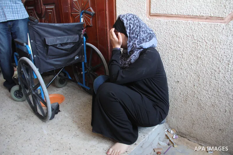 A relative of Palestinian security official Ashraf Saleh mourns during his funeral in Rafah in the southern Gaza Strip September 20, 2012. Israel killed two Palestinian security officials, one of them Saleh, in the Hamas...