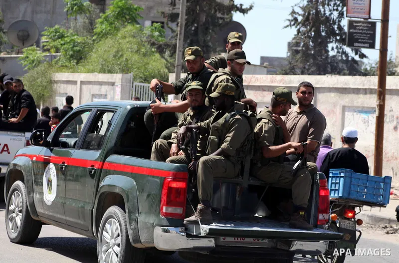 Palestinian security officers attends the funeral of Hamas officer Ashraf Saleh in Rafah in the southern Gaza Strip September 20, 2012. Israel killed two Palestinian security officials, one of them Saleh, in the Hamas-ru...