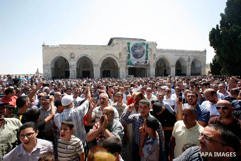Palestinians shout slogans during a protest against an anti-Islam movie made in the U.S. and French cartoons said to insult the Prophet Muhammad in Jerusalem's Old City, Sept. 21, 2012. Photo by Mahfouz Abu Turk
