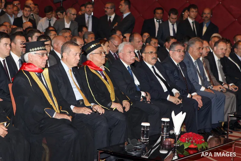 Turkish Prime Minister Recep Tayyip Erdogan and president of Palestine Mahmoud Abbas attend a ceremony in Ankara on September 21, 2012. Turkish Prime Minister Recep Tayyip Erdogan was awarded an honorary doctorate degree...