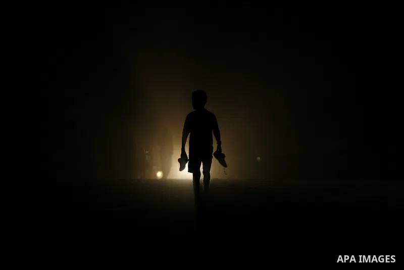Palestinians walk in the streets of in Rafah in the southern Gaza Strip on Sep. 21, 2012. Gaza Strip is experiencing a major electricity crisis because of a shortage of fuel for the power plant. Photo by Eyad Al Baba