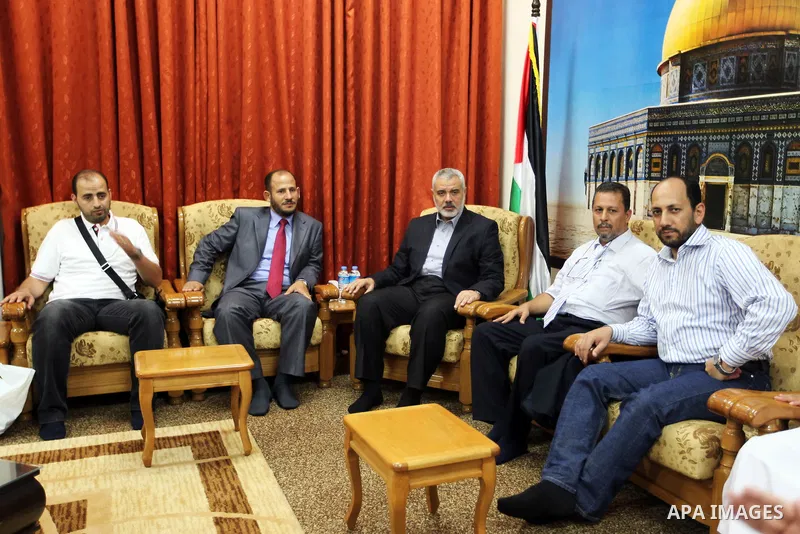 Palestinian Prime Minister in Gaza Ismail Haniyeh meets with "Convoy to fulfill 3" in his office in Gaza City, on Sep. 22, 2012. Photo by Ahmed Shaat