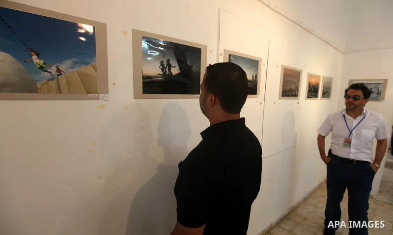 Palestinians participate in the photography gallery to calling for an end to the division between Hamas and Fatah in Gaza City, Saturday, Sep. 22, 2012. Photo by Majdi Fathi