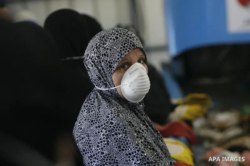 Palestinian women sort solid waste for production compost in station in Rafah in the southern Gaza Strip, on Sep. 23, 2012 Some Palestinians, driven by poverty exacerbated by the Israeli blockade and lack of employment o...