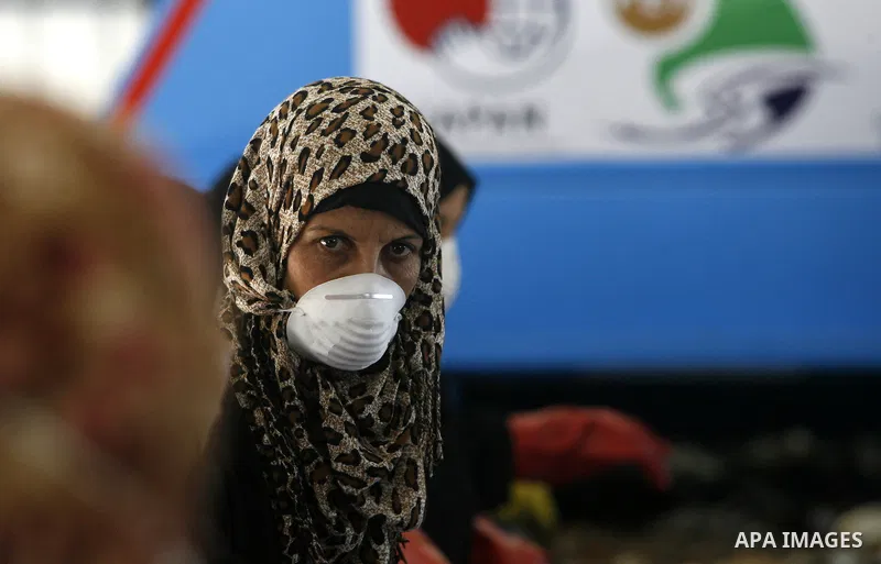 Palestinian women sort solid waste for production compost in station in Rafah in the southern Gaza Strip, on Sep. 23, 2012 Some Palestinians, driven by poverty exacerbated by the Israeli blockade and lack of employment o...