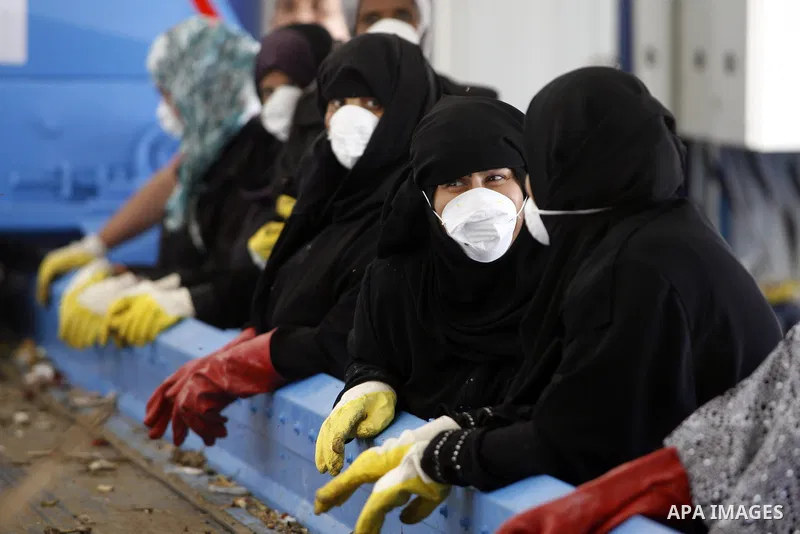 Palestinian women sort solid waste for production compost in station in Rafah in the southern Gaza Strip, on Sep. 23, 2012 Some Palestinians, driven by poverty exacerbated by the Israeli blockade and lack of employment o...