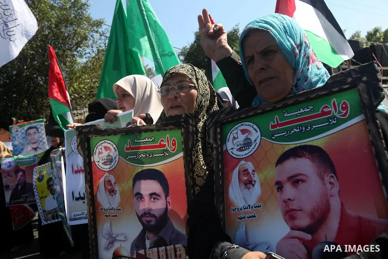 Palestinian women take part in a protest in Gaza City calling for the release of Palestinian prisoners from Israeli jails September 24, 2012. Photo by Majdi Fathi