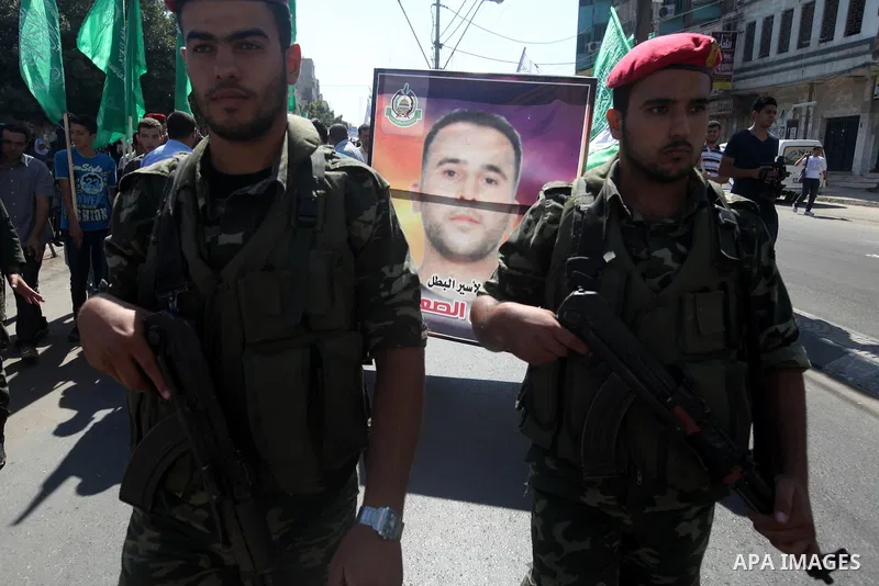 Palestinians police take part in a protest in Gaza City calling for the release of Palestinian prisoners from Israeli jails September 24, 2012. Photo by Majdi Fathi