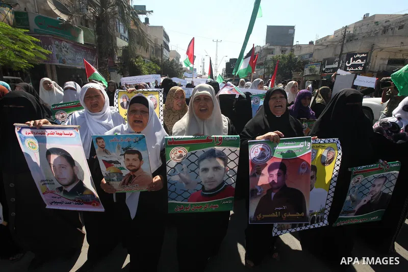 Palestinian women take part in a protest in Gaza City calling for the release of Palestinian prisoners from Israeli jails September 24, 2012. Photo by Majdi Fathi
