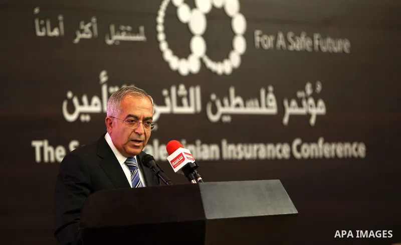 Palestinian Prime Minister, Salam Fayyad, speaks during of the second Conference on Palestine insurance companies, in the West Bank city of Ramallah, on Sep. 24, 2012. Photo by Mustafa Abu Dayeh
