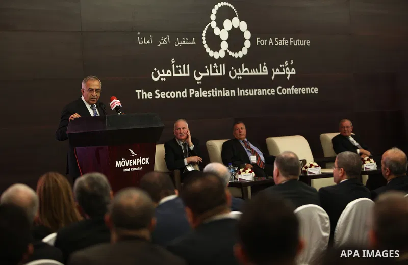 Palestinian Prime Minister, Salam Fayyad, speaks during of the second Conference on Palestine insurance companies, in the West Bank city of Ramallah, on Sep. 24, 2012. Photo by Mustafa Abu Dayeh