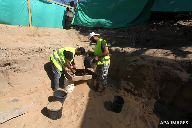 Palestinian employees work at the new archaeological site in Beit Lahia northern Gaza Strip on September 24, 2012. The French government is financing the restoration of the archaeological site which dates back to 329 AD...