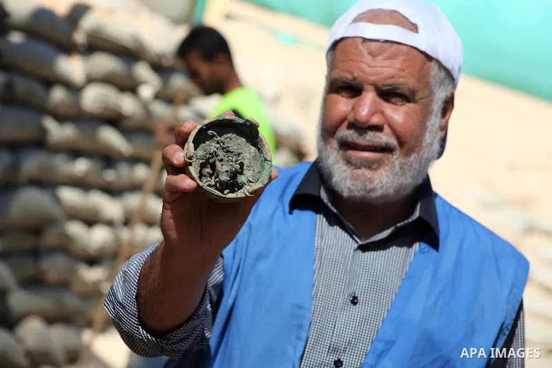 Palestinian employees work at the new archaeological site in Beit Lahia northern Gaza Strip on September 24, 2012. The French government is financing the restoration of the archaeological site which dates back to 329 AD...