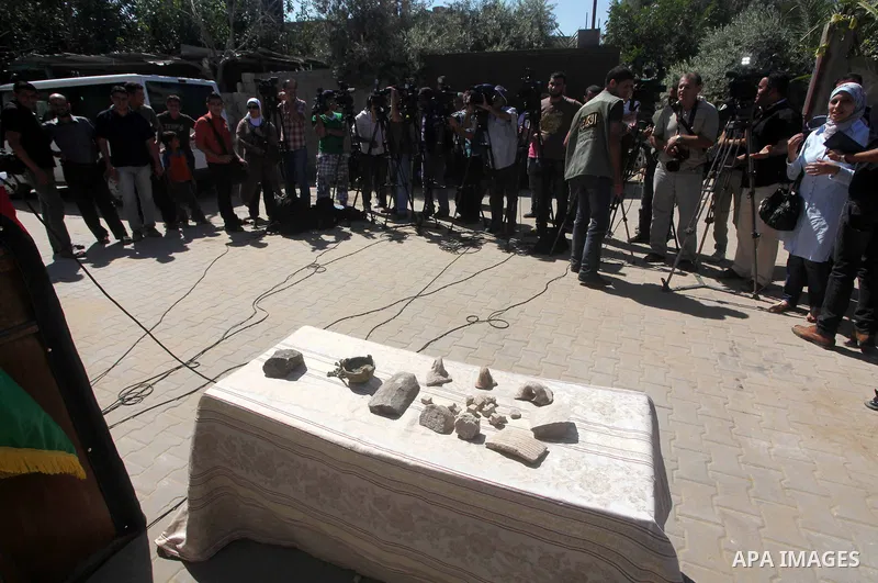 Palestinian employees work at the new archaeological site in Beit Lahia northern Gaza Strip on September 24, 2012. The French government is financing the restoration of the archaeological site which dates back to 329 AD...
