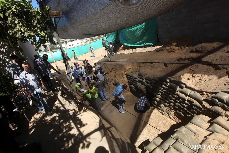 Palestinian employees work at the new archaeological site in Beit Lahia northern Gaza Strip on September 24, 2012. The French government is financing the restoration of the archaeological site which dates back to 329 AD...