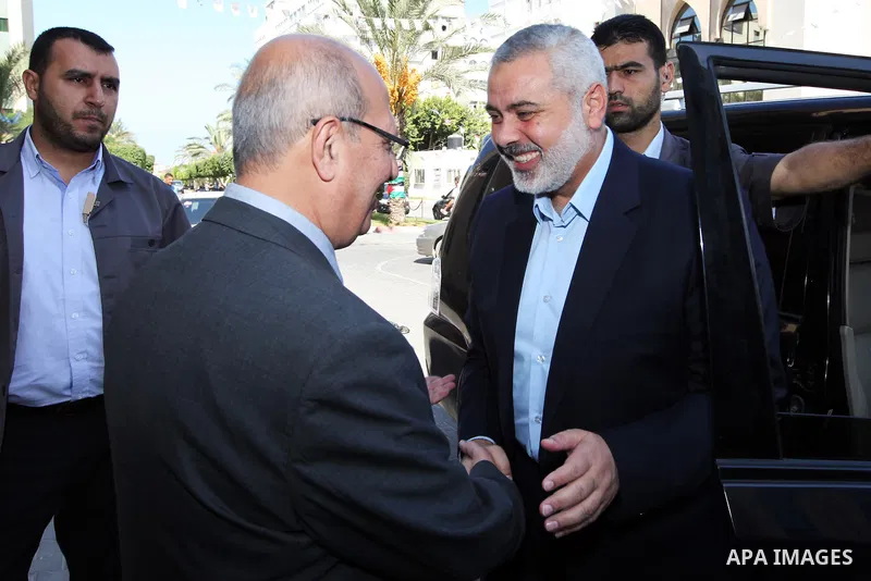 Palestinian Prime Minister in Gaza Ismail Hanyeh inaugurates the project of "Volition" to rehabilitate the invalids during the Israeli war on Gaza, at the Islamic University in Gaza city, Sept. 24, 2012. Photo by Office...