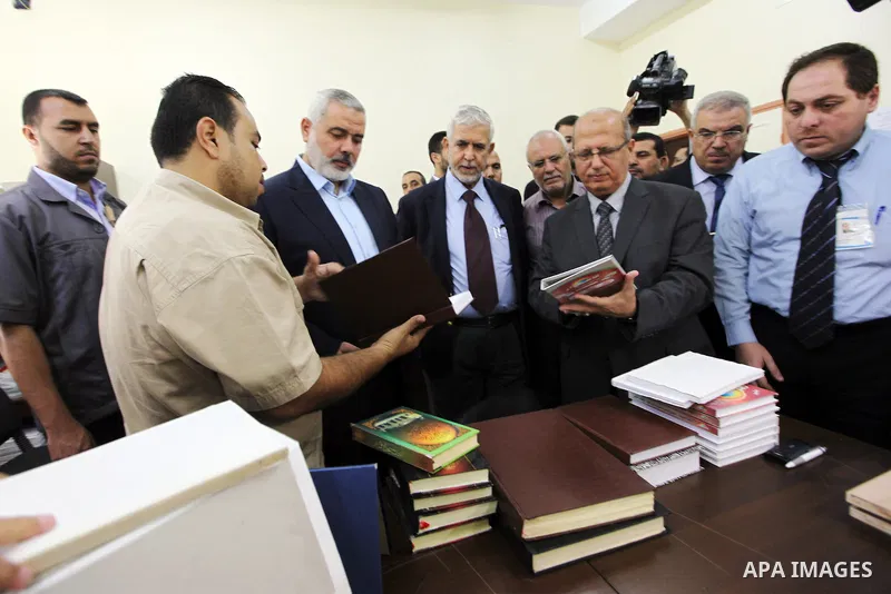 Palestinian Prime Minister in Gaza Ismail Hanyeh inaugurates the project of "Volition" to rehabilitate the invalids during the Israeli war on Gaza, at the Islamic University in Gaza city, Sept. 24, 2012. Photo by Office...