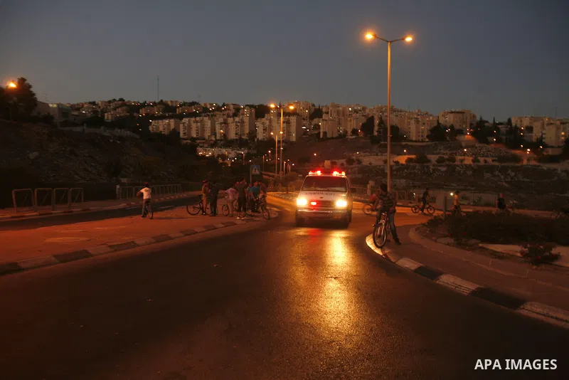 Palestinian children ride their bicycles during closing the roads between the Israeli settlements and the Arab neighborhoods by the Israeli border police in Jerusalem's old city, Sept. 25, 2012. Closes early for Yom Kipp...