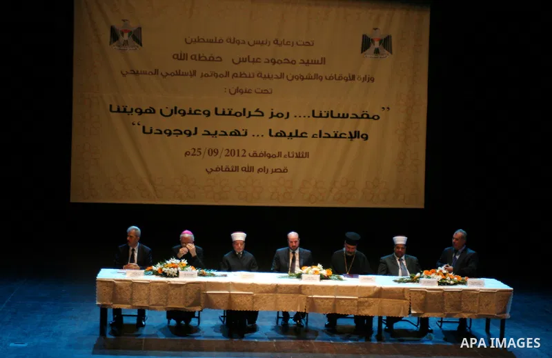 Palestinian Religious figures attend the Islamic-Christian conference in the West Bank city of Ramallah on September 25, 2012. Photo by Issam Rimawi