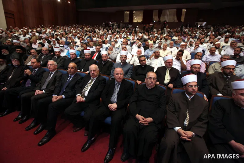 Palestinian Religious figures attend the Islamic-Christian conference in the West Bank city of Ramallah on September 25, 2012. Photo by Issam Rimawi