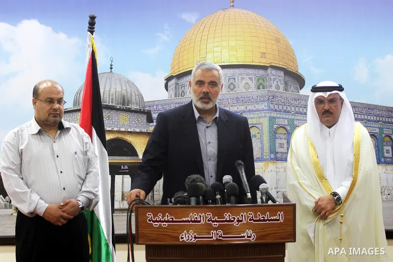 Palestinian Prime Minister in Gaza Ismail Haniyeh speaks to Media after meeting with the Qatari delegation to discuss how to rebuild the Gaza Strip, after the Israeli war in 2008 on the Gaza Strip, on September 25, 2012....