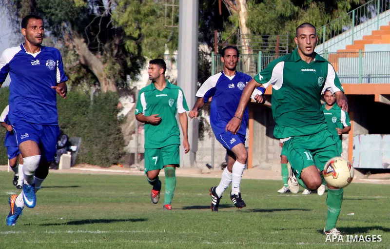 The Palestinian team of al-Shatie and the team of al-Shijaia during the premier league soccer match in Gaza city on 23 September 2012. Photo by Alaa Shamaly