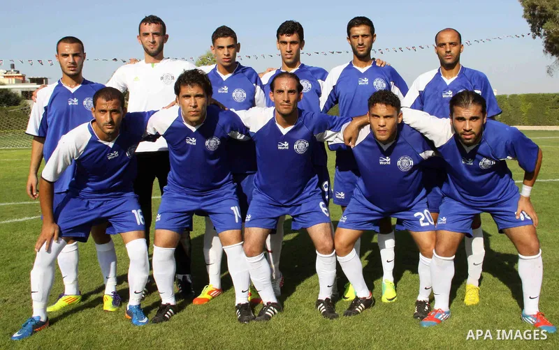 The Palestinian team of al-Shatie before a soccer match with the team of al-Shijaia during the premier league in Gaza city on 23 September 2012. Photo by Alaa Shamaly