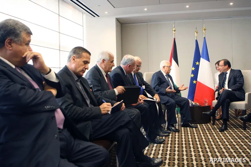 Palestinian President Mahmoud Abbas (Abu Mazen) meets with French President Holland, on Sept. 25, 2012. Photo by Thaer Ganaim