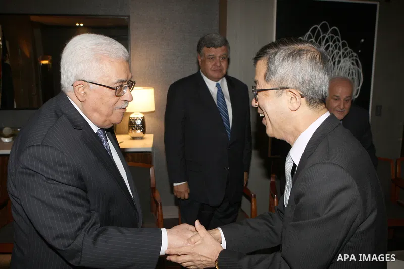 Palestinian President Mahmoud Abbas (Abu Mazen), meets with Japanese envoy to the Middle East Yutaka Oaamora in New York on Sept. 26, 2012. Photo by Thaer Ganaim