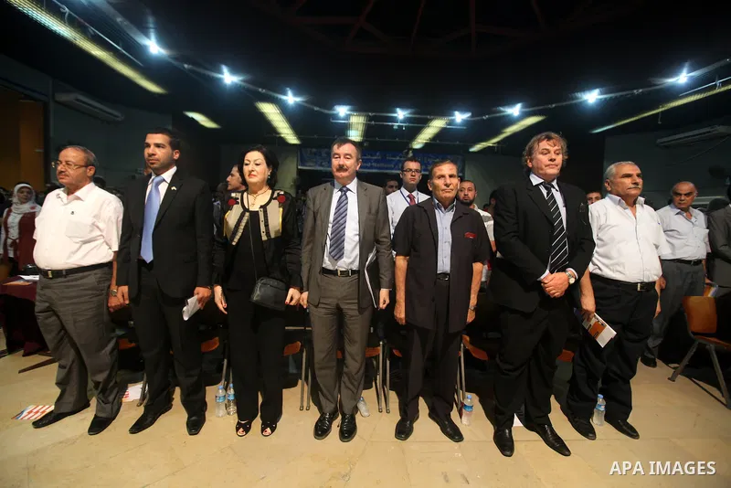 Palestinians attend the opining ceremony of Palestinian Model United Nations (PALMUN) in Gaza city on 27 September 2012 that is organized by the Migratory Letters campaign youth Group along with Gaza Culture and Developm...