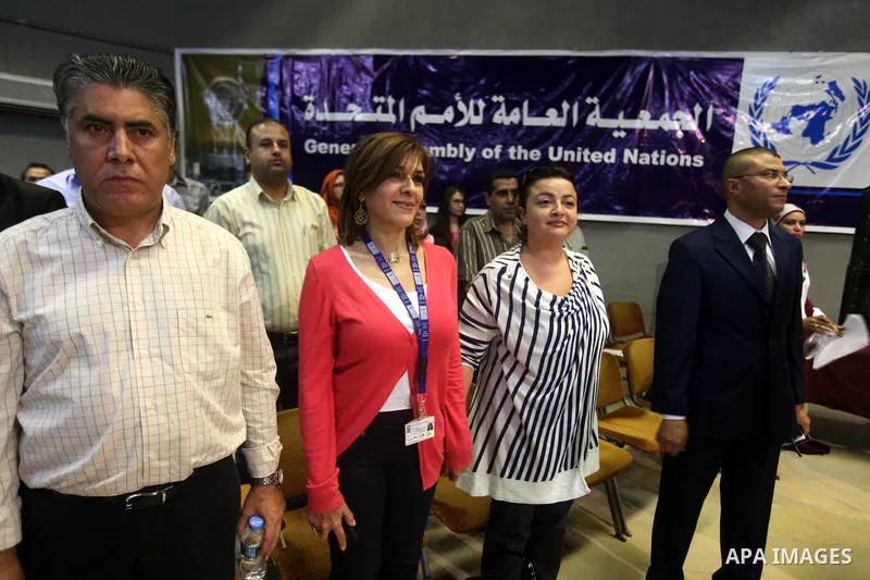 Palestinians attend the opining ceremony of Palestinian Model United Nations (PALMUN) in Gaza city on 27 September 2012 that is organized by the Migratory Letters campaign youth Group along with Gaza Culture and Developm...