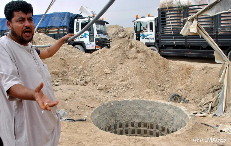 Palestinians work near smuggling tunnels along the border with Egypt in Rafah, southern Gaza Strip, Sunday, Sept. 30, 2012. Hamas officials say that over the past two months, Egypt has closed about 80 percent of the roug...