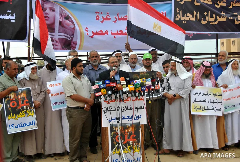 Palestinians participate a protest in Rafah, southern Gaza Strip, Sunday, Sept. 30, 2012. Hamas officials say that over the past two months, Egypt has closed about 80 percent of the roughly 450 tunnels. The move is a res...