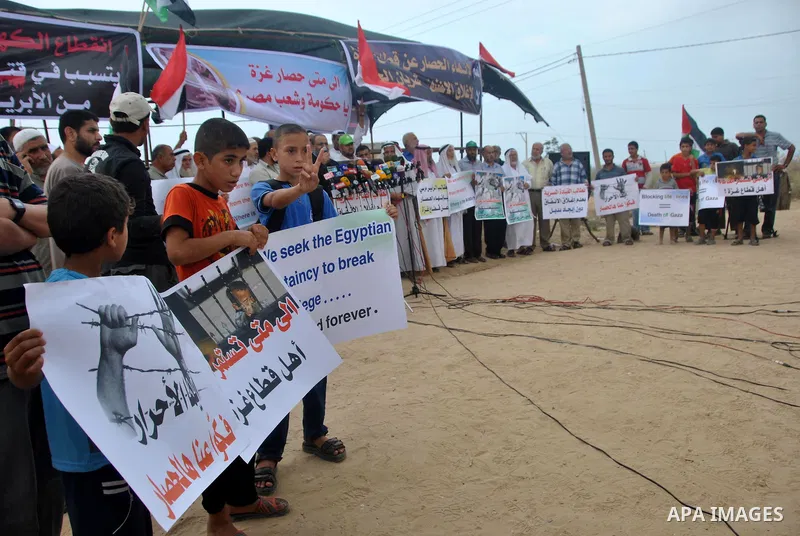 Palestinians participate a protest in Rafah, southern Gaza Strip, Sunday, Sept. 30, 2012. Hamas officials say that over the past two months, Egypt has closed about 80 percent of the roughly 450 tunnels. The move is a res...