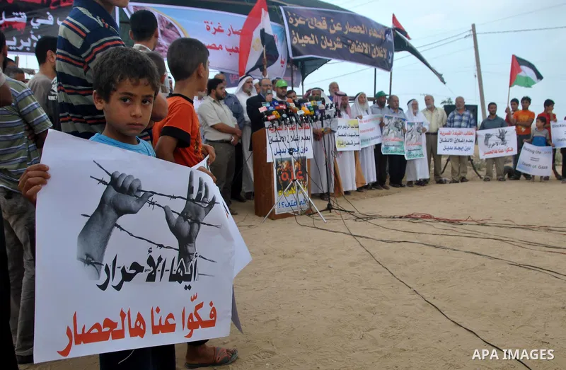 Palestinians participate a protest in Rafah, southern Gaza Strip, Sunday, Sept. 30, 2012. Hamas officials say that over the past two months, Egypt has closed about 80 percent of the roughly 450 tunnels. The move is a res...
