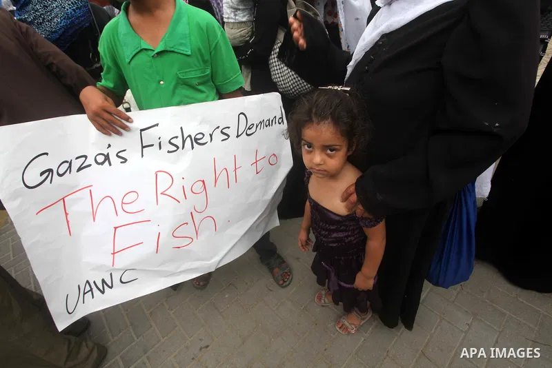 Palestinian women take part in a protest against what they say is frequent attacks on fishermen by the Israeli naval forces, in Gaza City September 30, 2012. Israel confines fishermen within a three-mile fishing zone in...