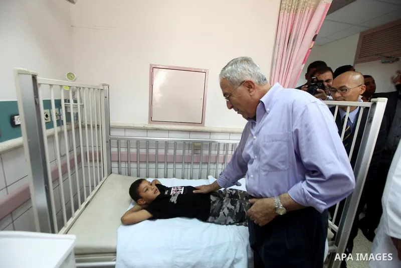 Palestinian Prime Minister Salam Fayyad visits the new hospital in the occupied West Bank city of Jericho on September 30, 2012. Photo by Mustafa Abu Dayeh