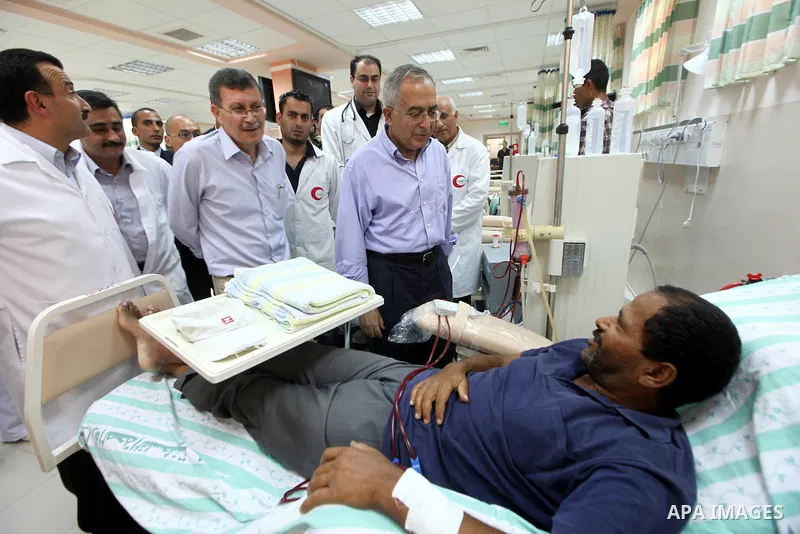 Palestinian Prime Minister Salam Fayyad visits the new hospital in the occupied West Bank city of Jericho on September 30, 2012. Photo by Mustafa Abu Dayeh