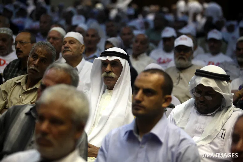 Palestinians attend the ceremony of The International Day of Older Persons in Gaza city on October 1, 2012. The Day of Older Persons is celebrated by raising awareness about issues affecting the elderly, such as senescen...