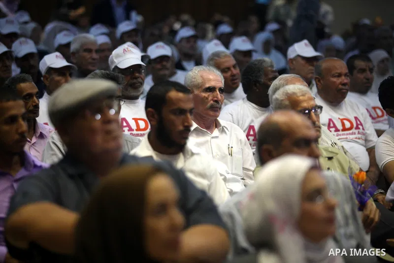 Palestinians attend the ceremony of The International Day of Older Persons in Gaza city on October 1, 2012. The Day of Older Persons is celebrated by raising awareness about issues affecting the elderly, such as senescen...