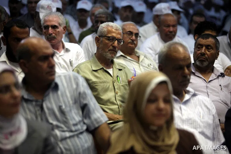 Palestinians attend the ceremony of The International Day of Older Persons in Gaza city on October 1, 2012. The Day of Older Persons is celebrated by raising awareness about issues affecting the elderly, such as senescen...