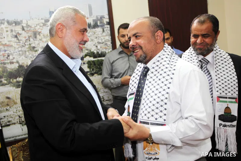 Palestinian Prime Minister in Gaza Strip, Ismail Haniyeh, receives convoy of "Miles of Smiles 16" in his office in Gaza City on October 1, 2012. Photo by Mohammed Ostaz